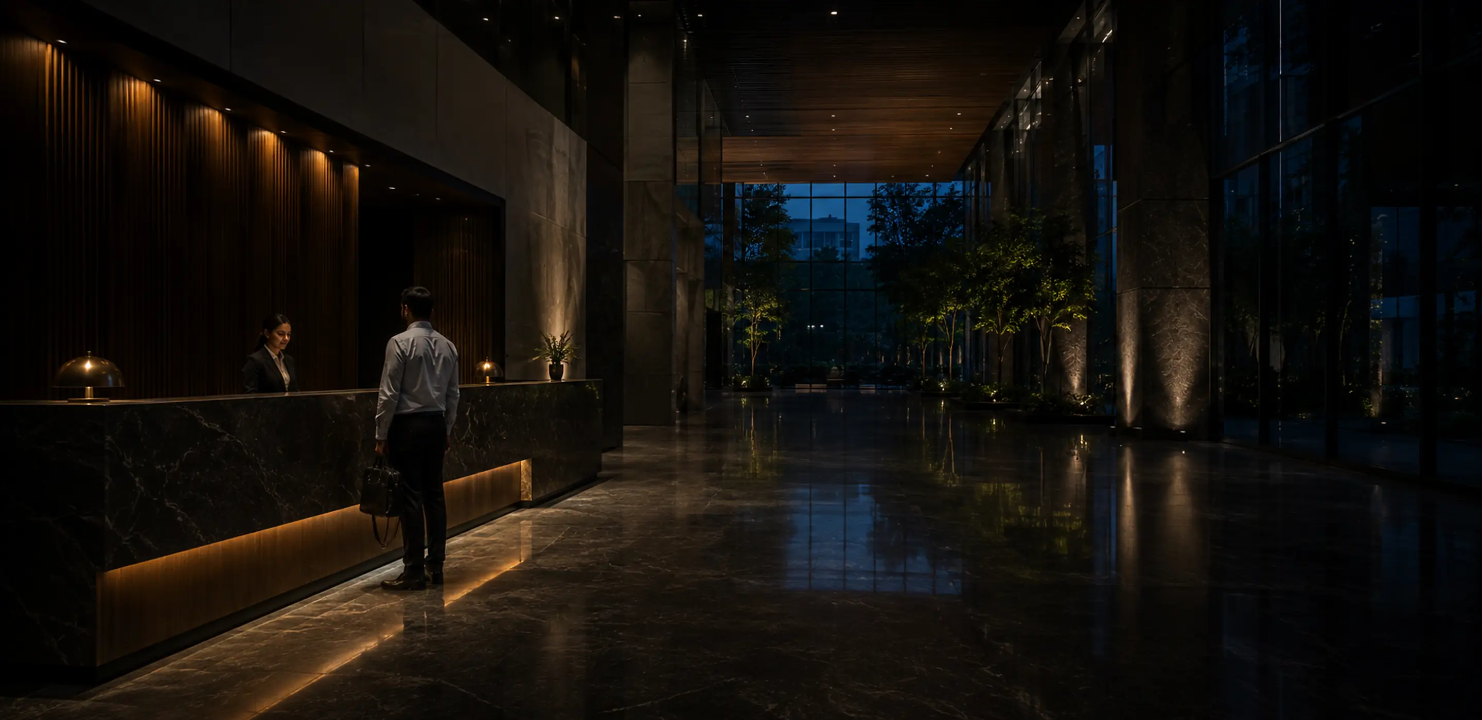 An office reception area with visitors arriving